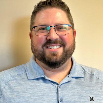 Adam Evenstad headshot